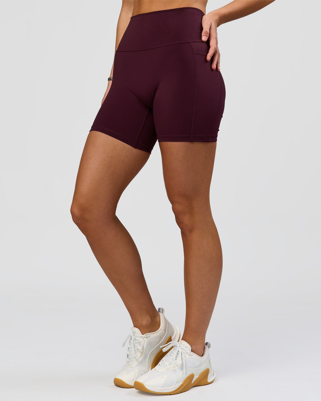 Woman wearing O.G. Fusion Ultra High-Rise 6" Short Pockets - Cherry Lacquer | Model:Amity | Size:S - view 8