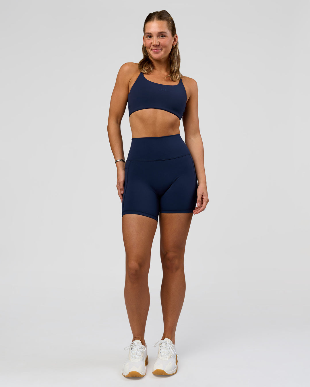 Woman wearing O.G. Fusion Ultra High-Rise 6" Short Pockets - Future Navy | Model:Amity | Size:S - view 6