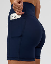 Woman wearing O.G. Fusion Ultra High-Rise 6" Short Pockets - Future Navy | Model:Amity | Size:S | Thumbnail Index: 3