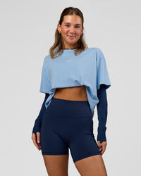 Woman wearing O.G. Fusion Ultra High-Rise 6" Short Pockets - Future Navy | Model:Amity | Size:S | Thumbnail Index: 0