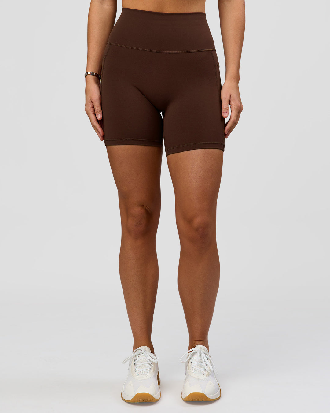 Woman wearing O.G. Fusion Ultra High-Rise 6" Short Pockets - Hot Chocolate | Model:Amity | Size:S - view 4