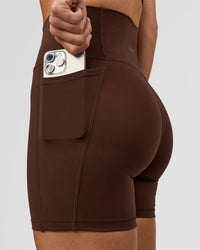 Woman wearing O.G. Fusion Ultra High-Rise 6" Short Pockets - Hot Chocolate | Model:Amity | Size:S | Thumbnail Index: 4