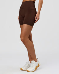 Woman wearing O.G. Fusion Ultra High-Rise 6" Short Pockets - Hot Chocolate | Model:Amity | Size:S | Thumbnail Index: 5