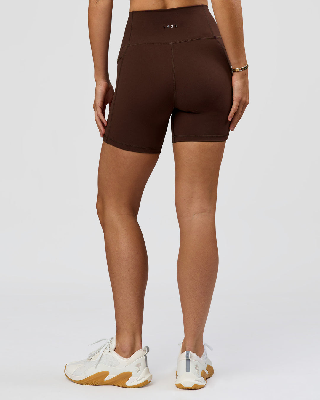 Woman wearing O.G. Fusion Ultra High-Rise 6" Short Pockets - Hot Chocolate | Model:Amity | Size:S - view 7
