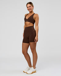 Woman wearing O.G. Fusion Ultra High-Rise 6" Short Pockets - Hot Chocolate | Model:Amity | Size:S | Thumbnail Index: 7