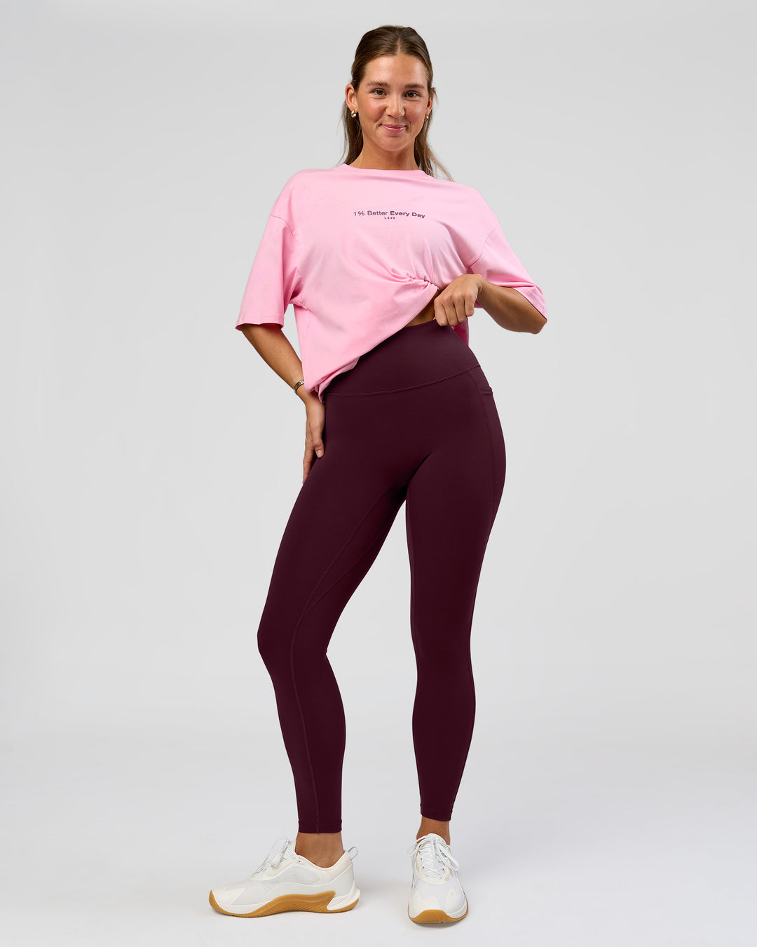 Woman wearing O.G. Fusion Ultra High-Rise Full Length Legging Pockets - Cherry Lacquer | Model:Amity | Size:S - view 1