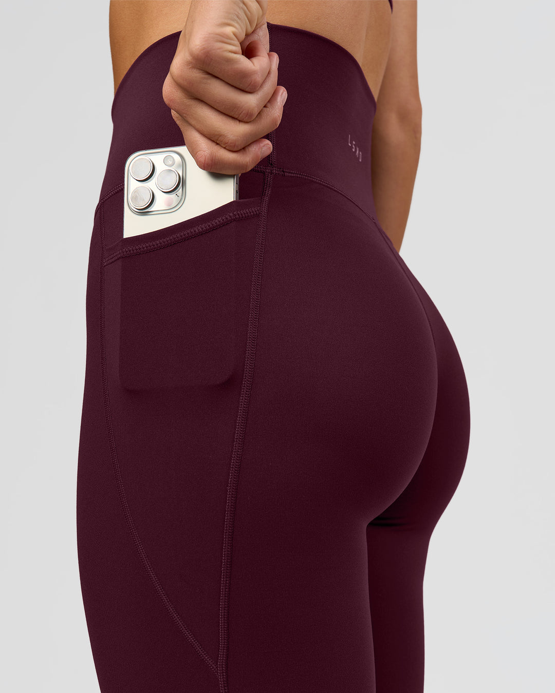 Woman wearing O.G. Fusion Ultra High-Rise Full Length Legging Pockets - Cherry Lacquer | Model:Amity | Size:S - view 7