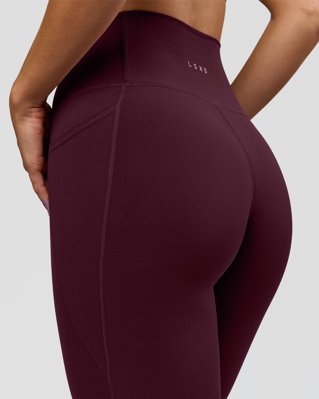 Woman wearing O.G. Fusion Ultra High-Rise Full Length Legging Pockets - Cherry Lacquer | Model:Amity | Size:S - view 9