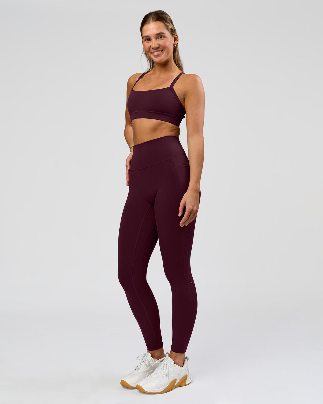 Woman wearing O.G. Fusion Ultra High-Rise Full Length Legging Pockets - Cherry Lacquer | Model:Amity | Size:S - view 6