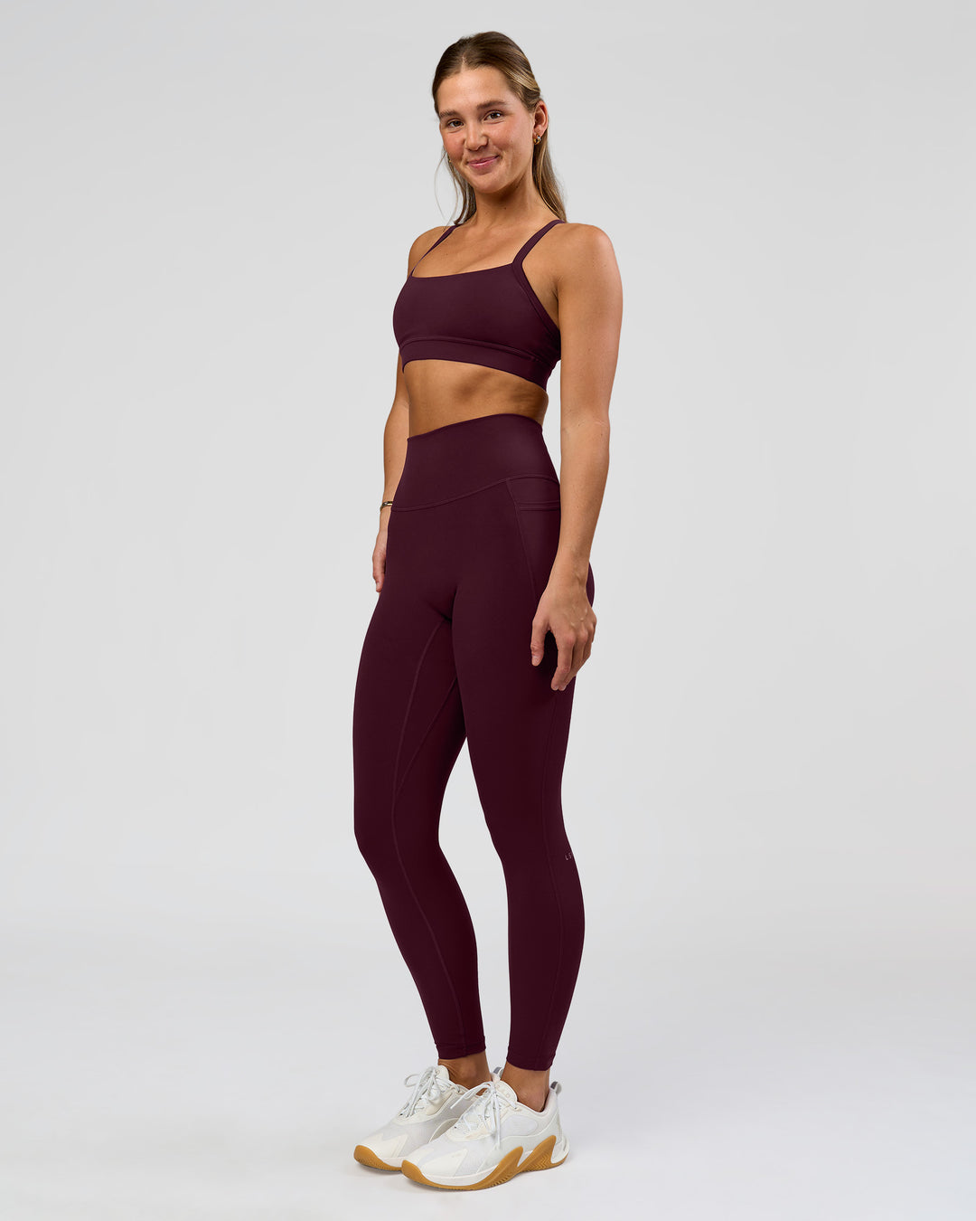 Woman wearing O.G. Fusion Ultra High-Rise Full Length Legging Pockets - Cherry Lacquer | Model:Amity | Size:S - view 8