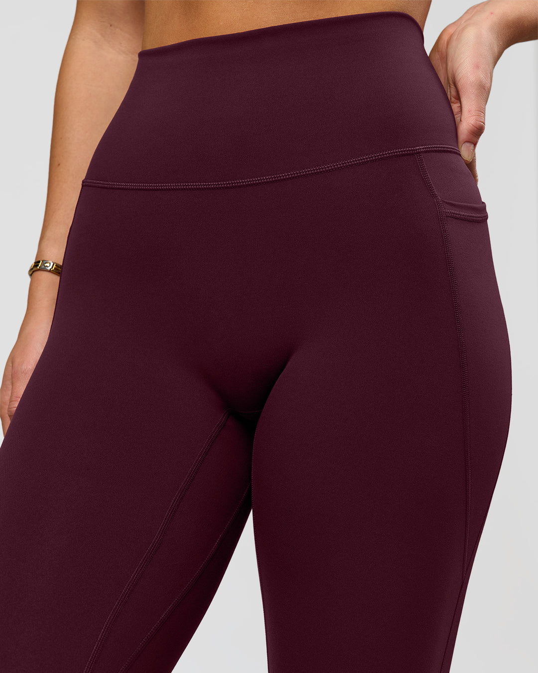 Woman wearing O.G. Fusion Ultra High-Rise Full Length Legging Pockets - Cherry Lacquer | Model:Amity | Size:S - view 10