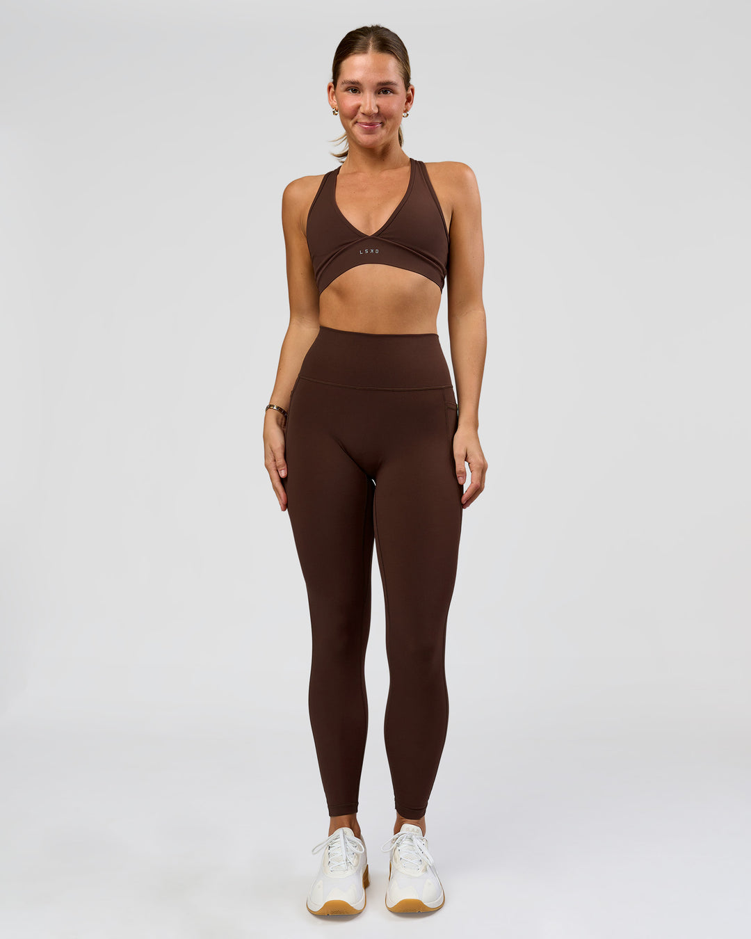 Woman wearing O.G. Fusion Ultra High-Rise Full Length Legging Pockets - Hot Chocolate | Model:Amity | Size:S - view 2