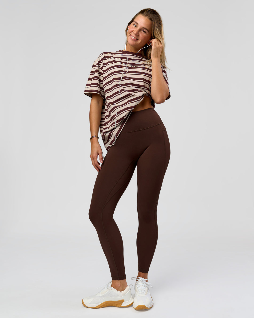 Woman wearing O.G. Fusion Ultra High-Rise Full Length Legging Pockets - Hot Chocolate | Model:Amity | Size:S - view 1