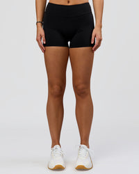 Woman wearing RXD Mid-Rise 4" Short - Black | Model:Amity | Size:S | Thumbnail Index: 5