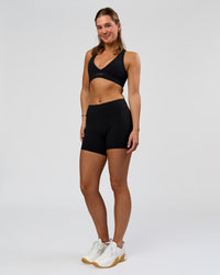 Woman wearing RXD Mid-Rise 6" Short - Black | Model:Amity | Size:S | Thumbnail Index: 3