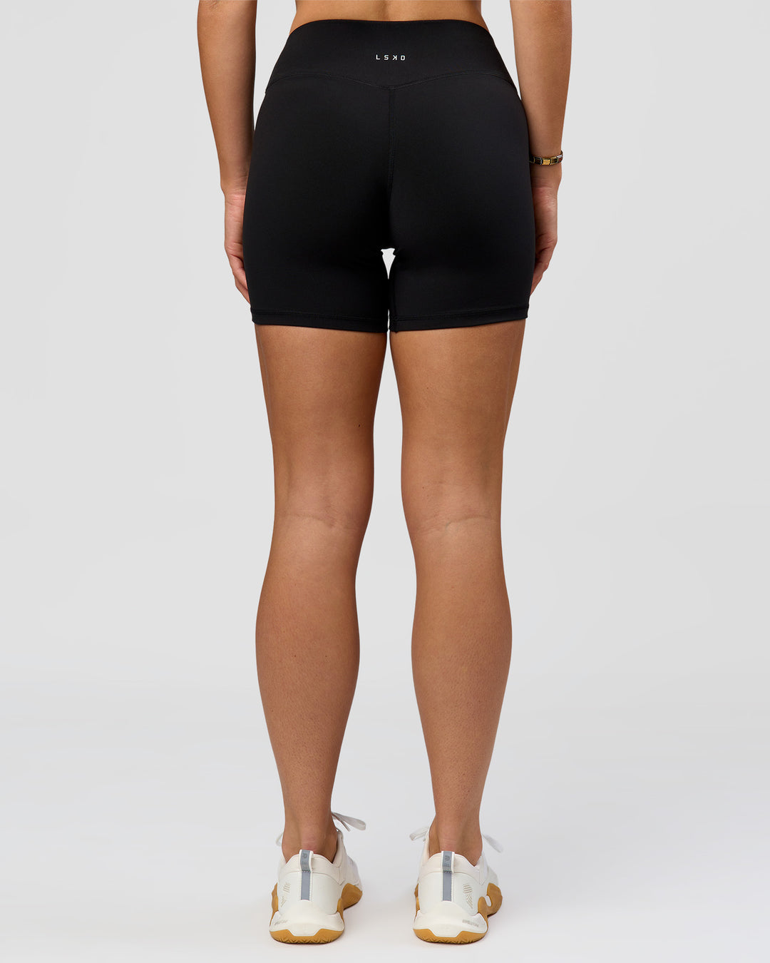 Woman wearing RXD Mid-Rise 6" Short - Black | Model:Amity | Size:S - view 7
