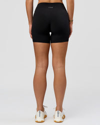 Woman wearing RXD Mid-Rise 6" Short - Black | Model:Amity | Size:S | Thumbnail Index: 6
