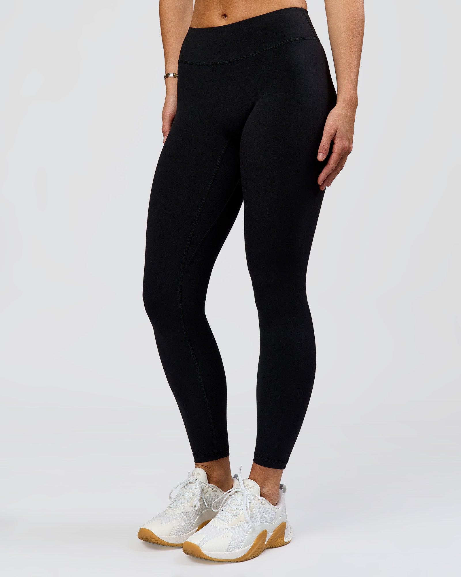 Woman wearing RXD Mid-Rise Full Length Legging - Black | Model:Amity | Size:S