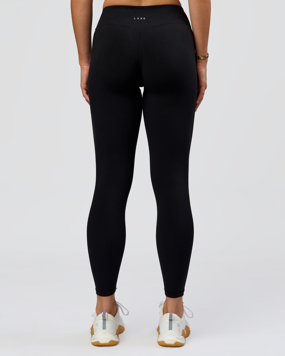 Woman wearing RXD Mid-Rise Full Length Legging - Black | Model:Amity | Size:S - view 8