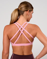 Woman wearing Velocity Sports Bra - Pink Rose | Model:Amity | Size:S | Thumbnail Index: 0