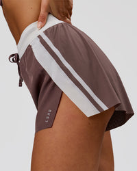 Woman wearing Accelerate 3" Force High-Rise Running Short - Cocoa Powder | Model:Bianca | Size:S | Thumbnail Index: 3