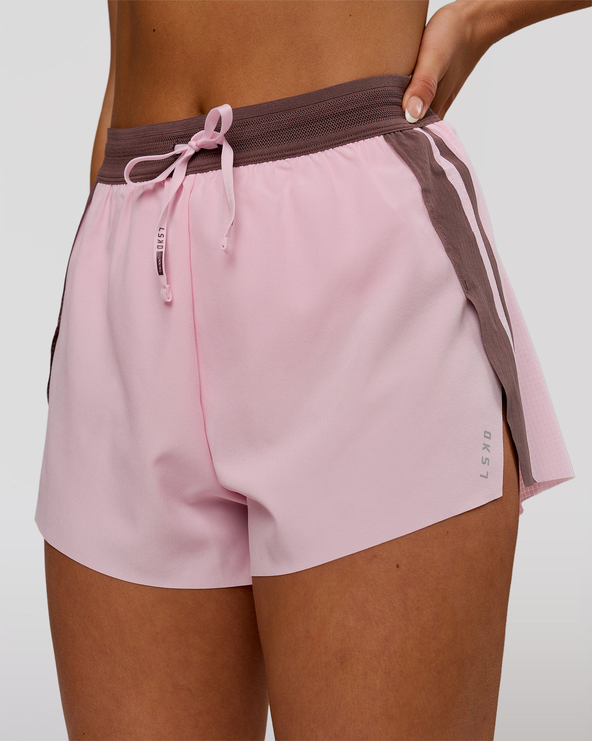Woman wearing Accelerate 3" Force High-Rise Running Short - Marshmallow-Cocoa Powder | Model:Bianca | Size:S - view 1