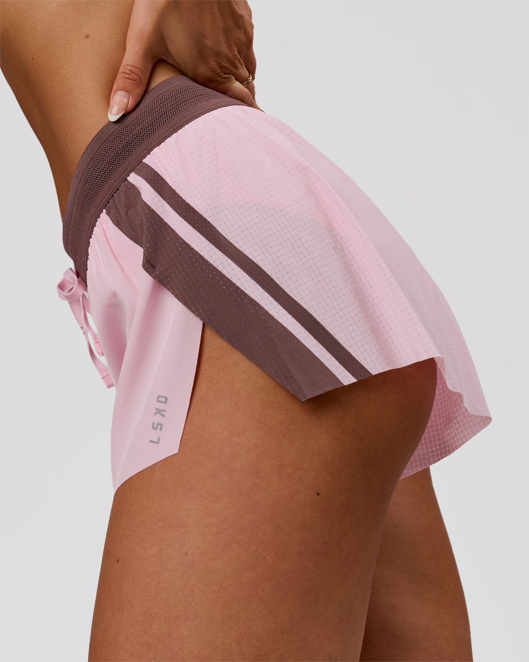 Woman wearing Accelerate 3" Force Mid-Rise Running Short - Marshmallow-Cocoa Powder | Model:Bianca | Size:S - view 3