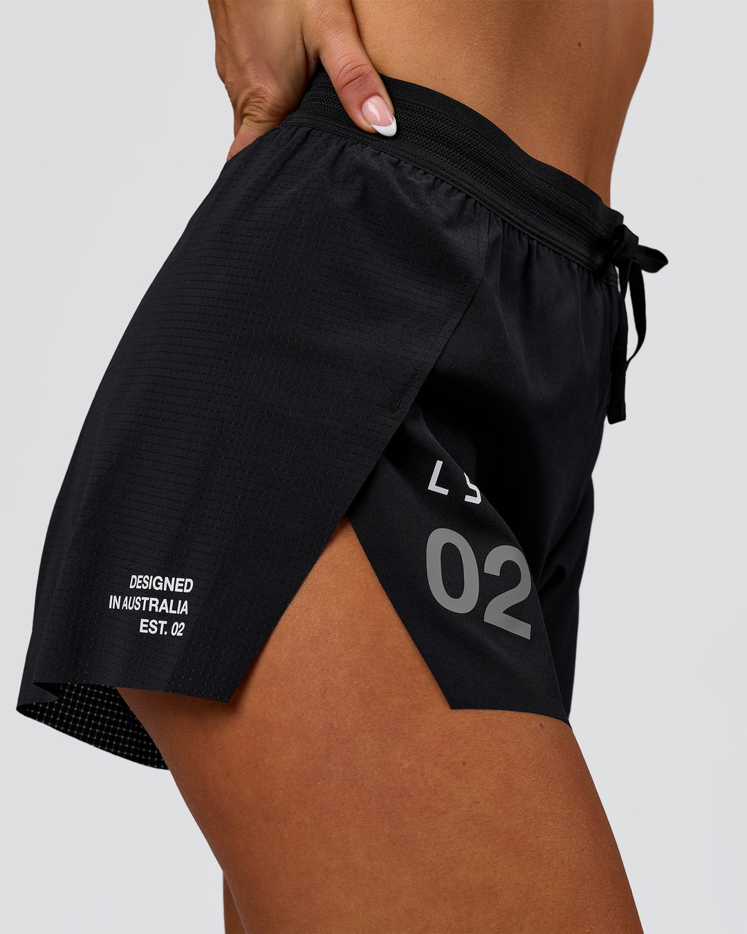 Woman wearing Accelerate 3" High-Rise Running Short - Black-Tech Department | Model:Bianca | Size:S - view 3