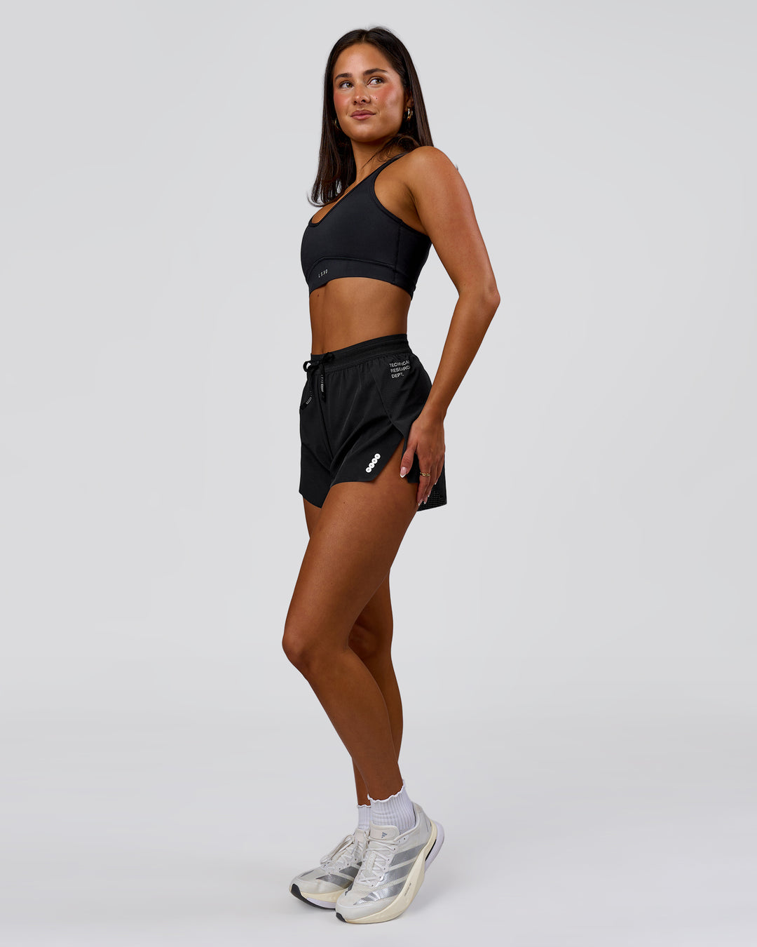 Woman wearing Accelerate 3" High-Rise Running Short - Black-Tech Department | Model:Bianca | Size:S - view 6