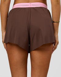 Woman wearing Accelerate 3" High-Rise Running Short - Neapolitan | Model:Bianca | Size:S | Thumbnail Index: 9