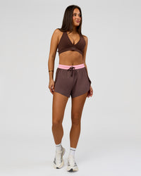 Woman wearing Accelerate 3" High-Rise Running Short - Neapolitan | Model:Bianca | Size:S | Thumbnail Index: 7