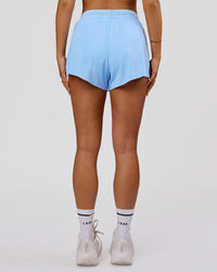 Woman wearing Accelerate 3" High-Rise Running Short - Open Air-Marshmallow | Model:Bianca | Size:S | Thumbnail Index: 9
