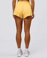 Woman wearing Accelerate 3" High-Rise Running Short - Sunbeam-Lemon | Model:Bianca | Size:S | Thumbnail Index: 11