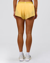 Woman wearing Accelerate 3" High-Rise Running Short - Sunbeam-Lemon | Model:Bianca | Size:S | Thumbnail Index: 12