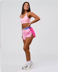 Woman wearing Accelerate 3" High-Rise Running Short - Ultra Pink-Tech Department | Model:Bianca | Size:S | Thumbnail Index: 4