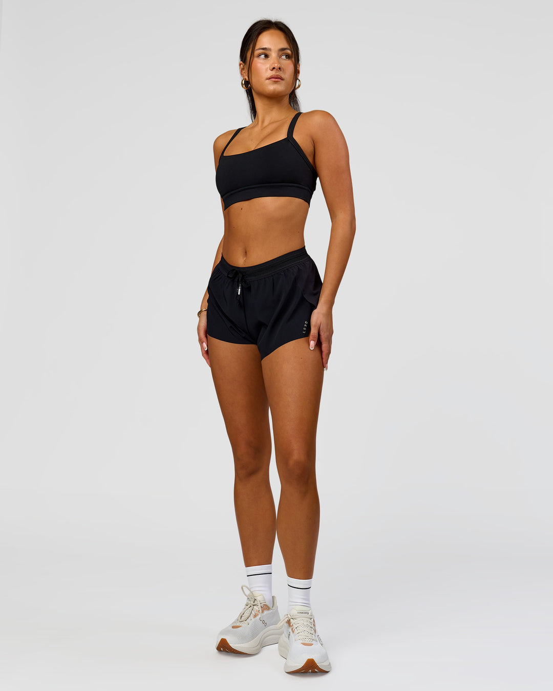 Woman wearing Accelerate 3" Mid-Rise Running Short - Black | Model:Bianca | Size:S - view 6