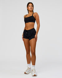 Woman wearing Accelerate 3" Mid-Rise Running Short - Black | Model:Bianca | Size:S | Thumbnail Index: 5