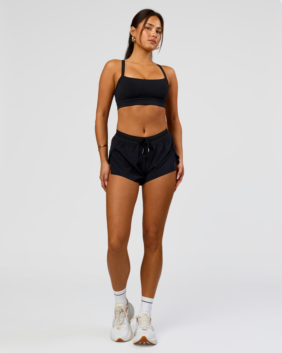 Woman wearing Accelerate 3" Mid-Rise Running Short - Black | Model:Bianca | Size:S - view 7