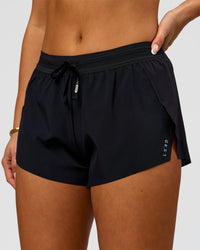 Woman wearing Accelerate 3" Mid-Rise Running Short - Black | Model:Bianca | Size:S | Thumbnail Index: 0