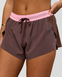 Woman wearing Accelerate 3" Mid-Rise Running Short - Neapolitan | Model:Bianca | Size:S | Thumbnail Index: 0