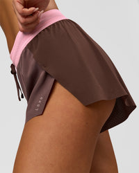 Woman wearing Accelerate 3" Mid-Rise Running Short - Neapolitan | Model:Bianca | Size:S | Thumbnail Index: 4