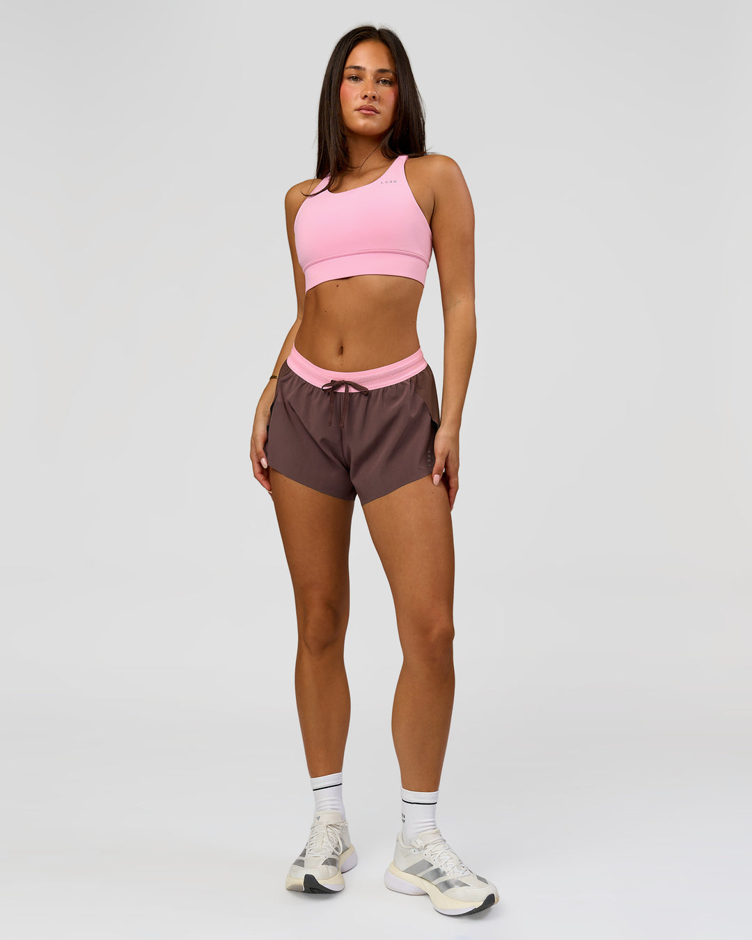 Woman wearing Accelerate 3" Mid-Rise Running Short - Neapolitan | Model:Bianca | Size:S - view 2