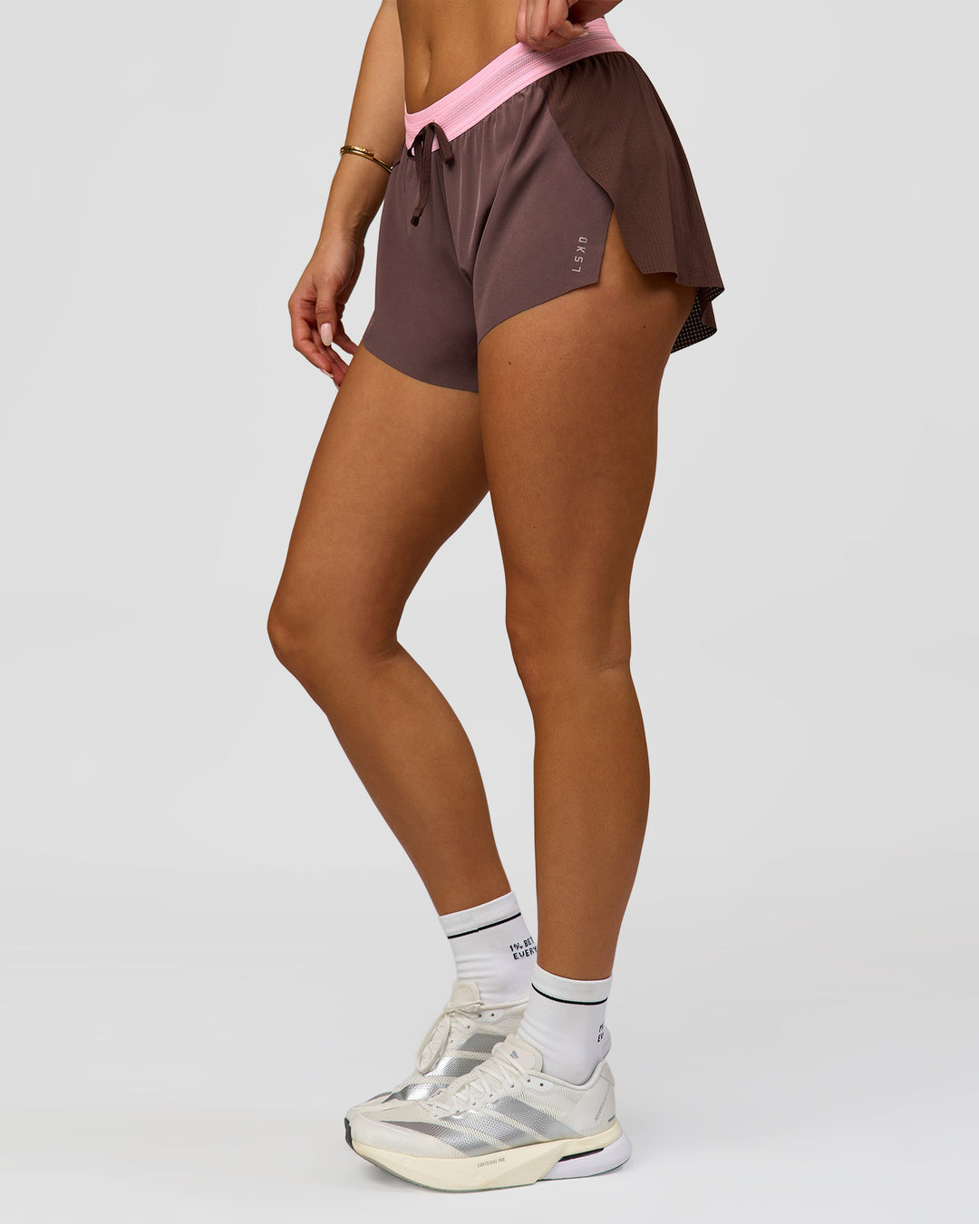 Woman wearing Accelerate 3" Mid-Rise Running Short - Neapolitan | Model:Bianca | Size:S - view 3