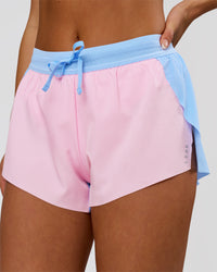 Woman wearing Accelerate 3" Mid-Rise Running Short - Open Air-Marshmallow | Model:Bianca | Size:S | Thumbnail Index: 0