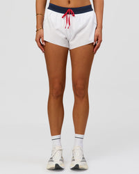 Woman wearing Accelerate 3" Mid-Rise Running Short - White-Future Navy | Model:Bianca | Size:S | Thumbnail Index: 5