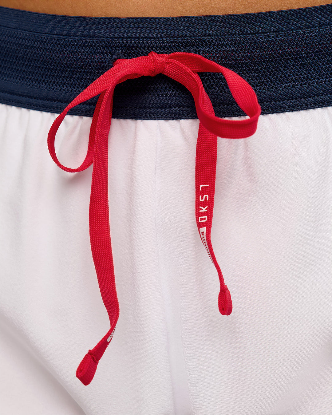Woman wearing Accelerate 3" Mid-Rise Running Short - White-Future Navy | Model:Bianca | Size:S - view 14