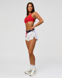 Woman wearing Accelerate 3" Mid-Rise Running Short - White-Future Navy | Model:Bianca | Size:S | Thumbnail Index: 8