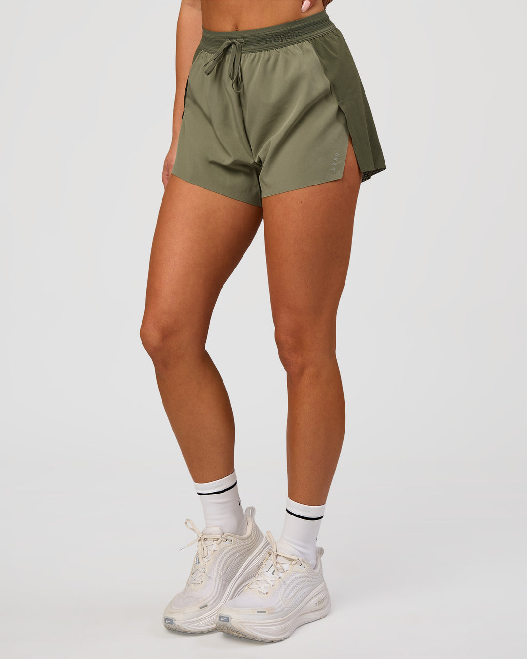 Woman wearing Accelerate 3" High-Rise Running Short - Pure Olive-Fog | Model:Bianca | Size:S - view 6