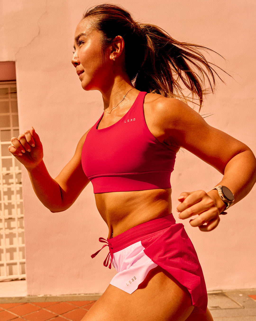 Woman wearing Accelerate Sports Bra - Scarlet | Model:Bianca | Size:S - view 7