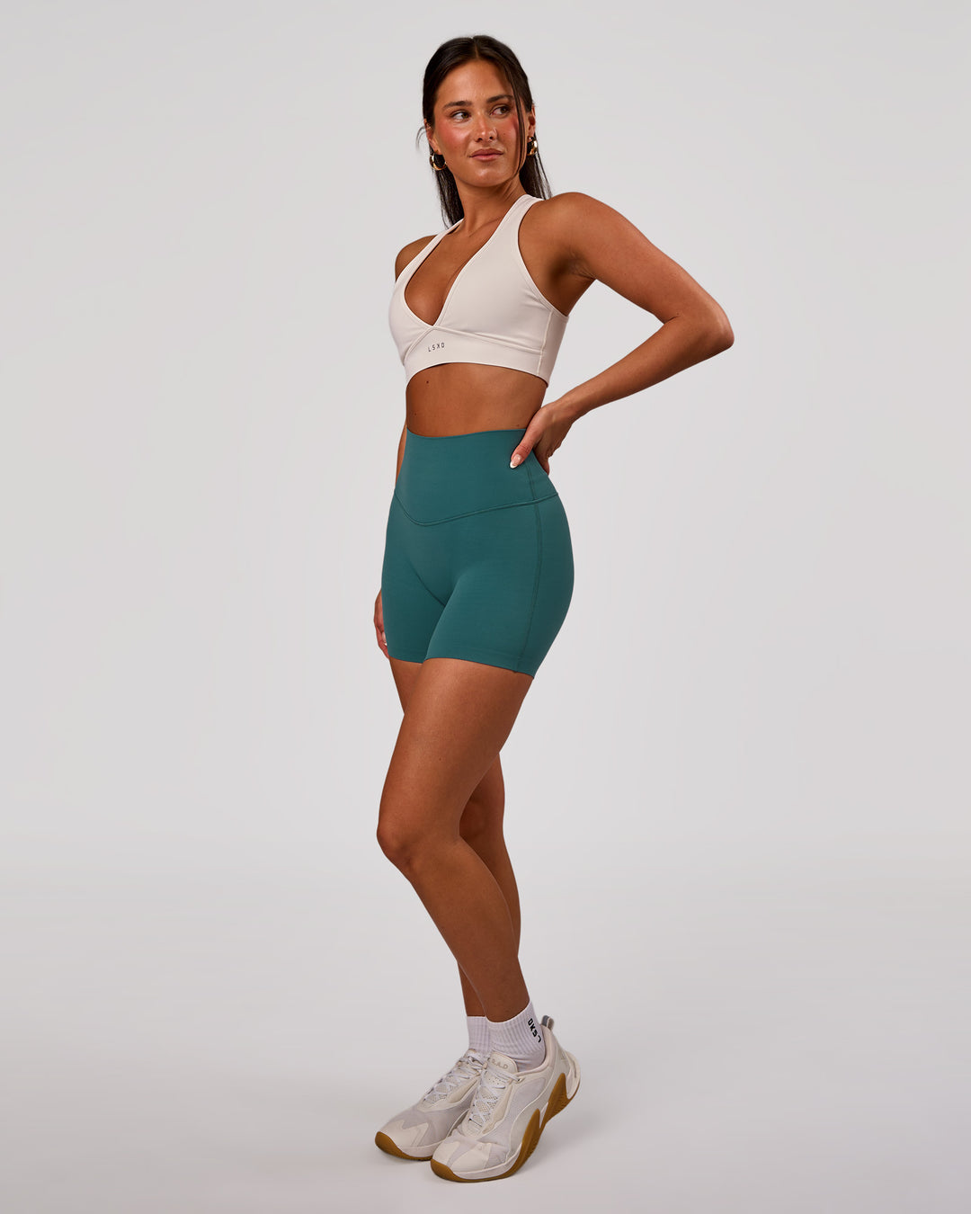 Woman wearing Elixir High-Rise 6” Short - Transformative Teal | Model:Bianca | Size:S - view 7